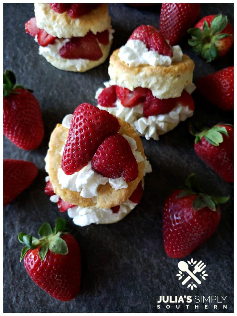 Traditional old fashioned strawberry shortcakes with fresh spring strawberries with whipped cream