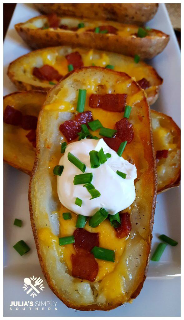 Perfect Potato Skins with crispy skin served on a white platter for game day