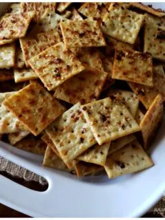 Southern baked seasoned party crackers - Fire Crackers - in a white serving bowl