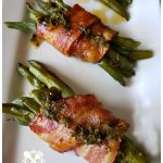 The BEST green bean bundles wrapped in bacon and drizzled with a tangy and delicious sauce