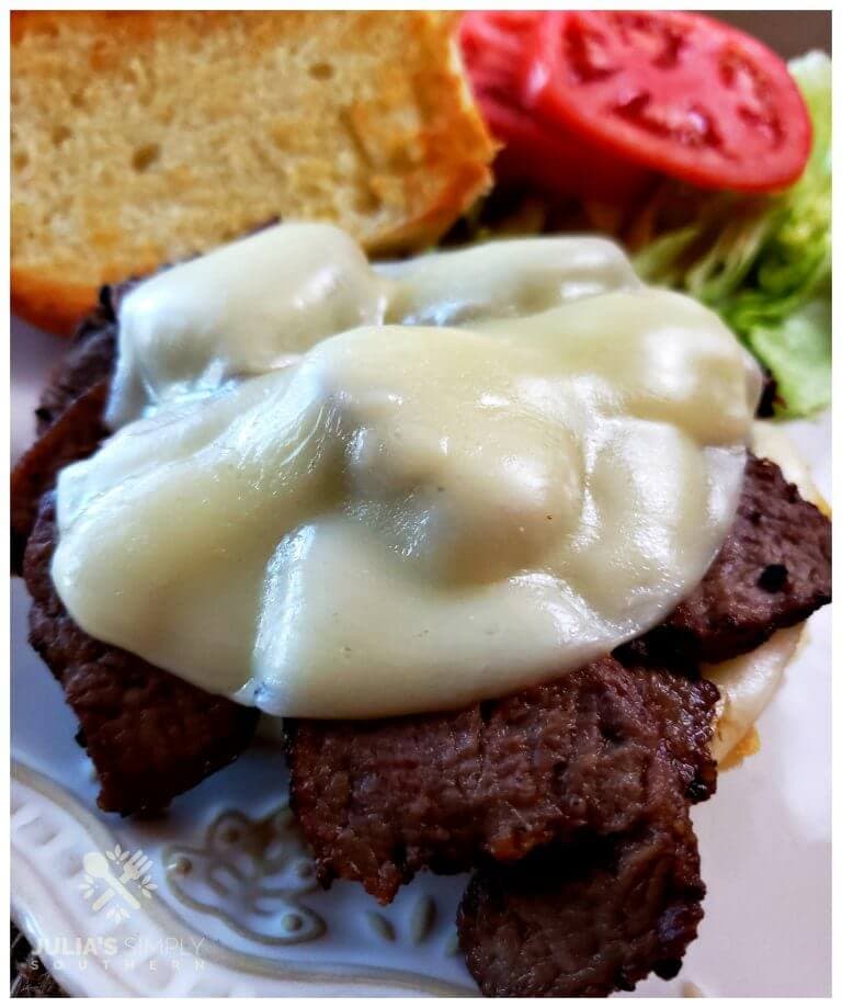 Awesome steak lover sandwich with leftover beef tenderloin and Provolone cheese.