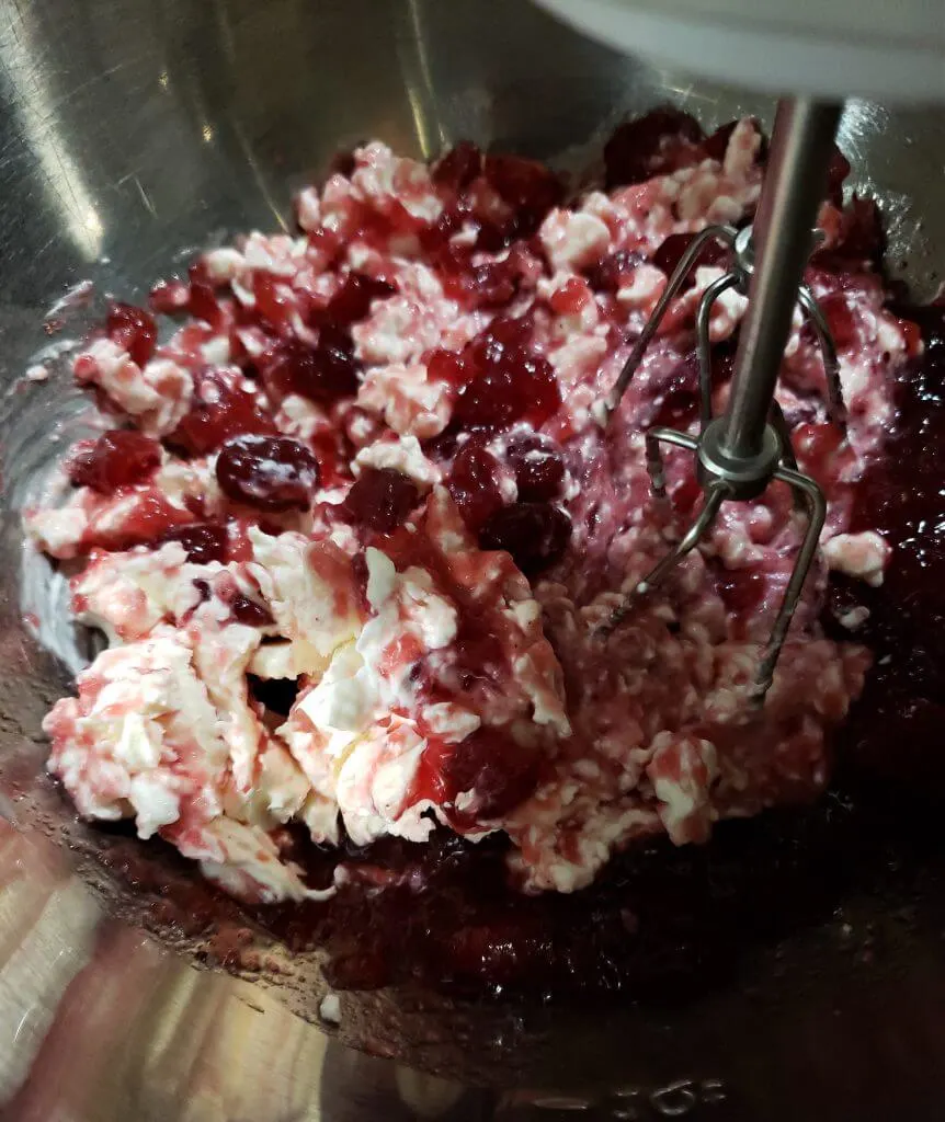 Mixing a cranberry pie filling