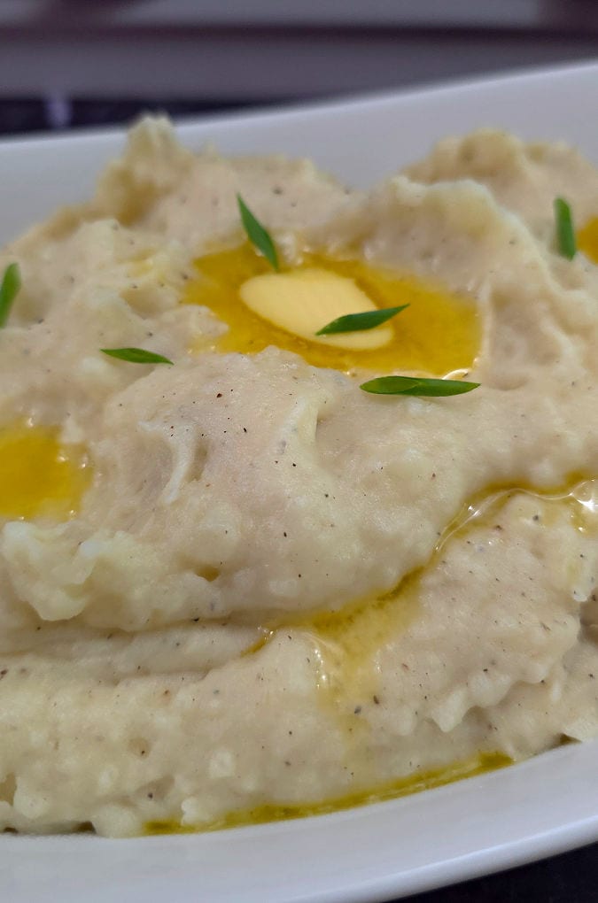 Creamy, buttery, buttermilk mashed potatoes garnished with sliced scallions