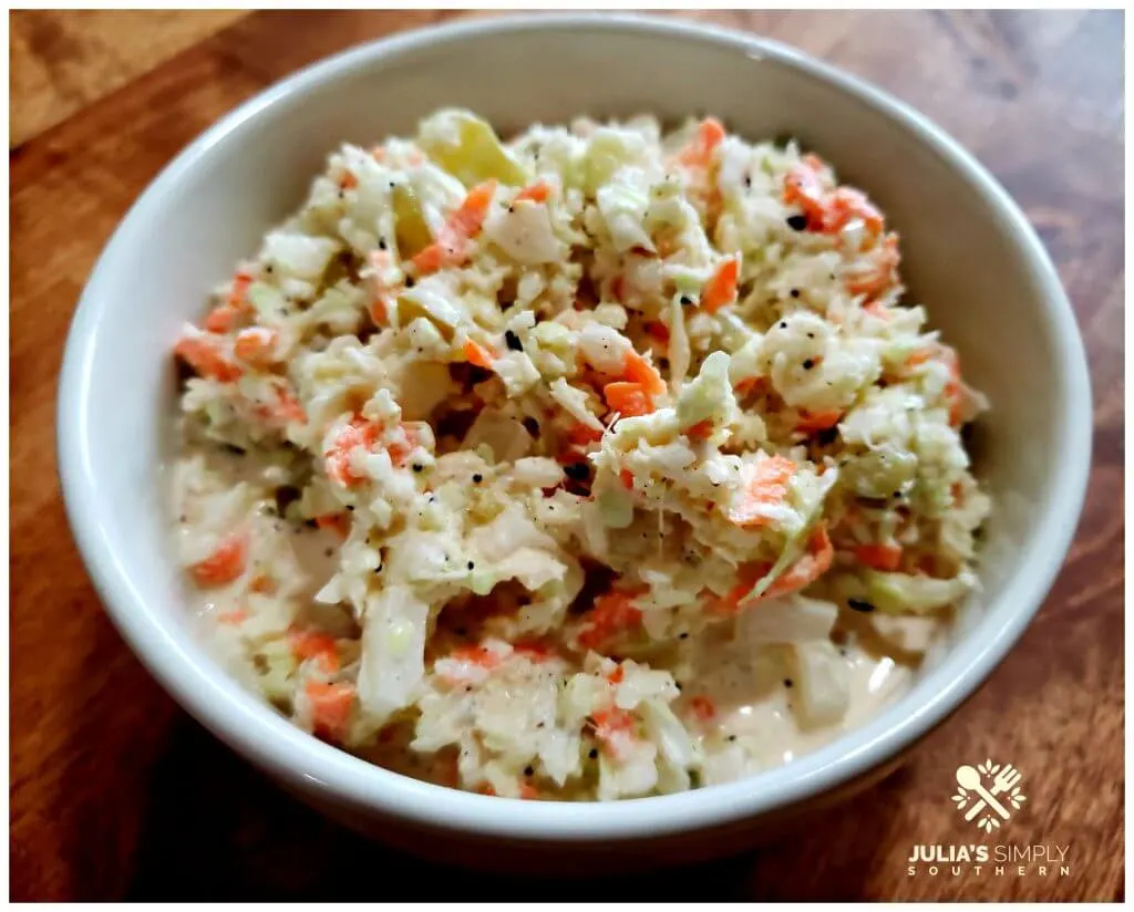 Dill Pickle Buttermilk Coleslaw Recipe in a white serving bowl