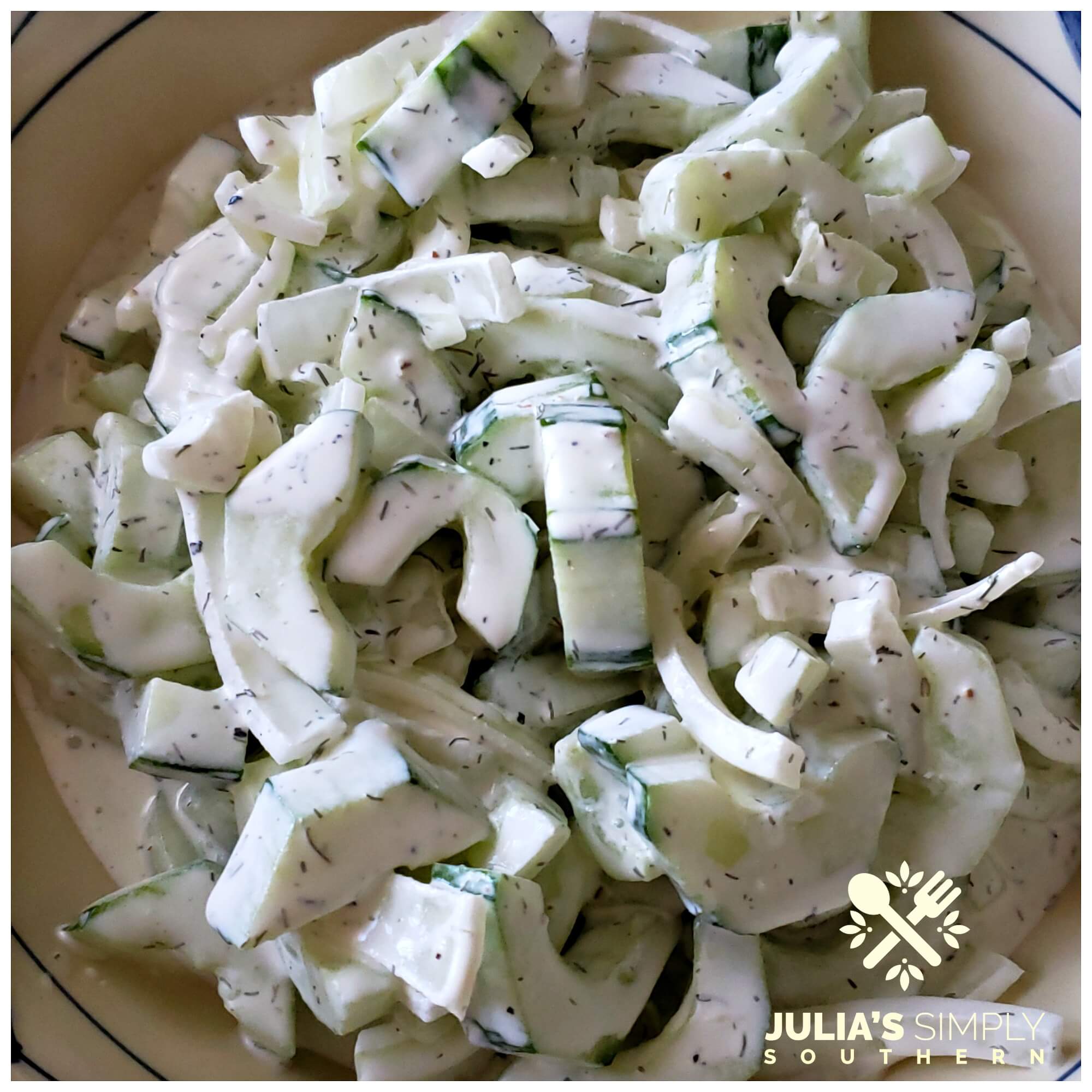 Cool Southern creamy cucumbers in a tangy creamy dressing with onion and dill