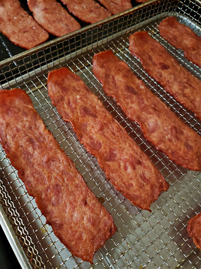 air fryer basket with crispy turkey bacon strips
