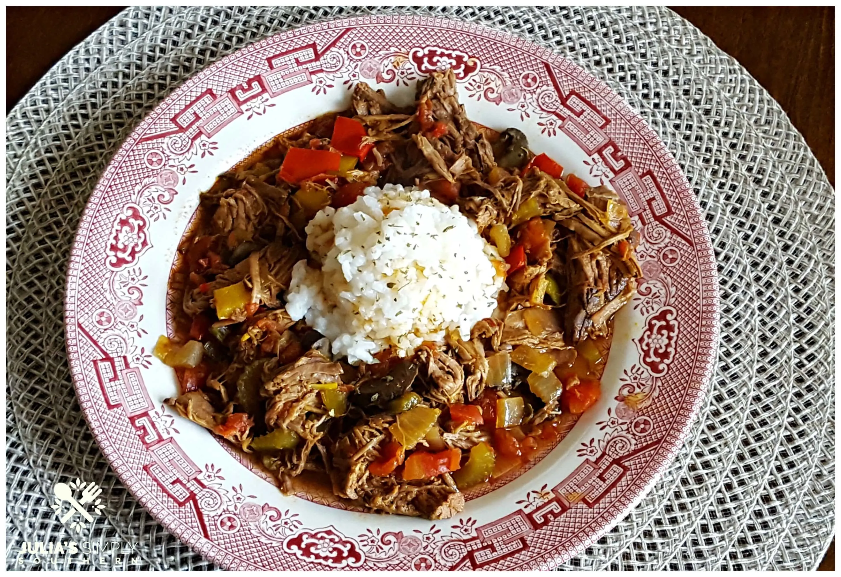 Easy Crock Pot Beef Recipe served with rice on a china plate