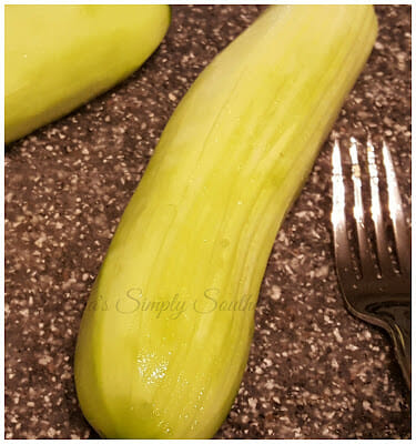 Score Cucumber with a fork