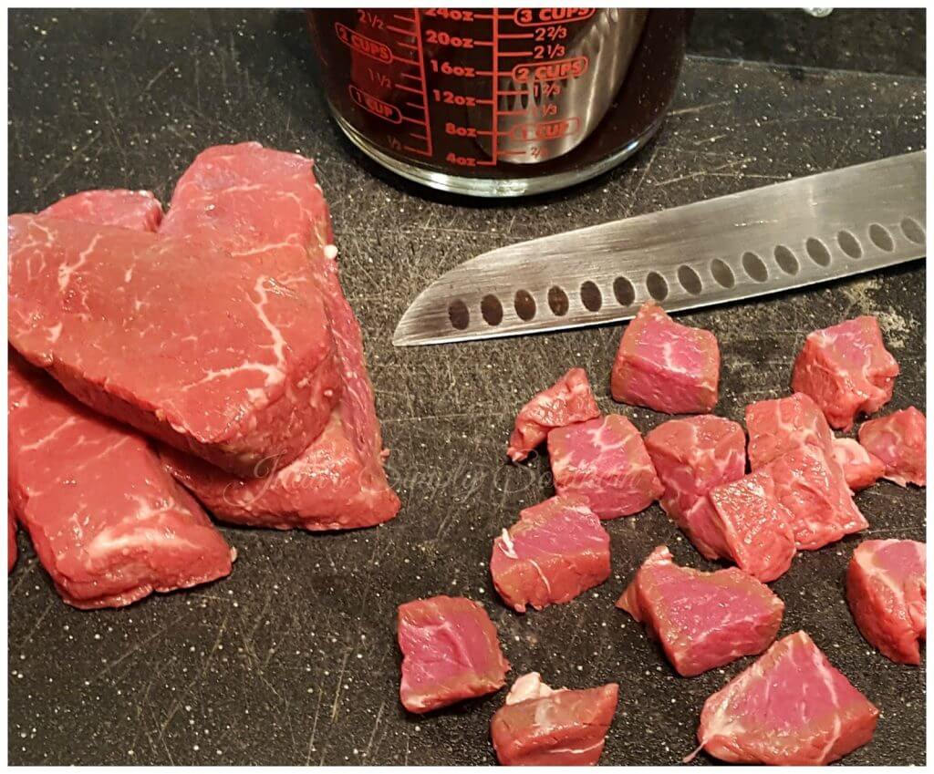 cutting beef into cubes