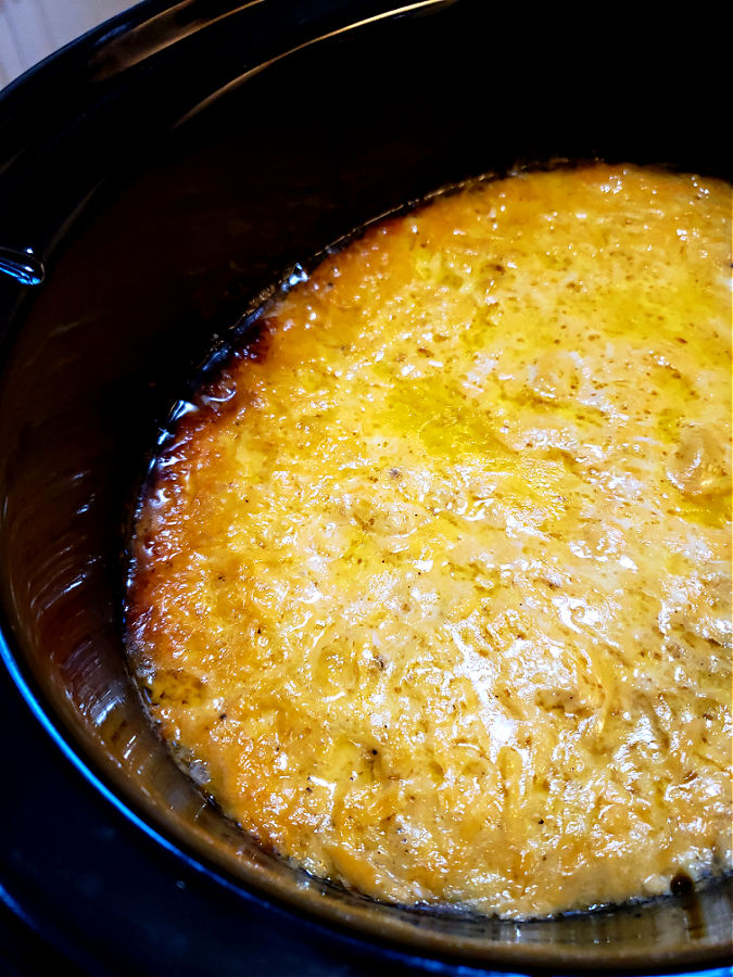 preparing Southern style macaroni and cheese in a Crock Pot