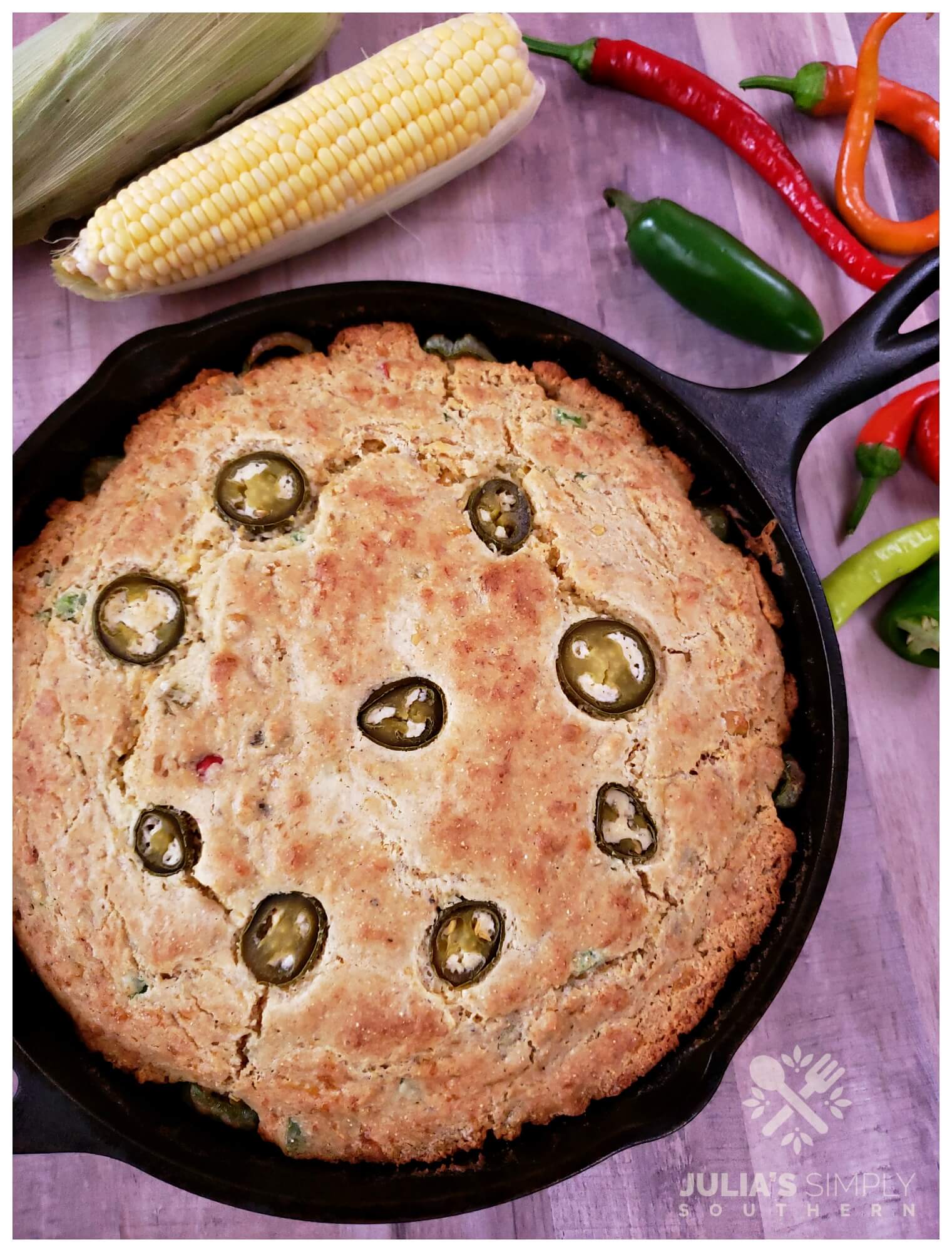 Easy Mexican Cornbread with cheese, chili peppers and cheese. A savory bread side dish made in a cast iron skillet.