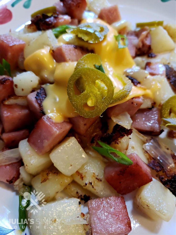 Delicious Spam Fried Potatoes with melted cheese and jalapenos