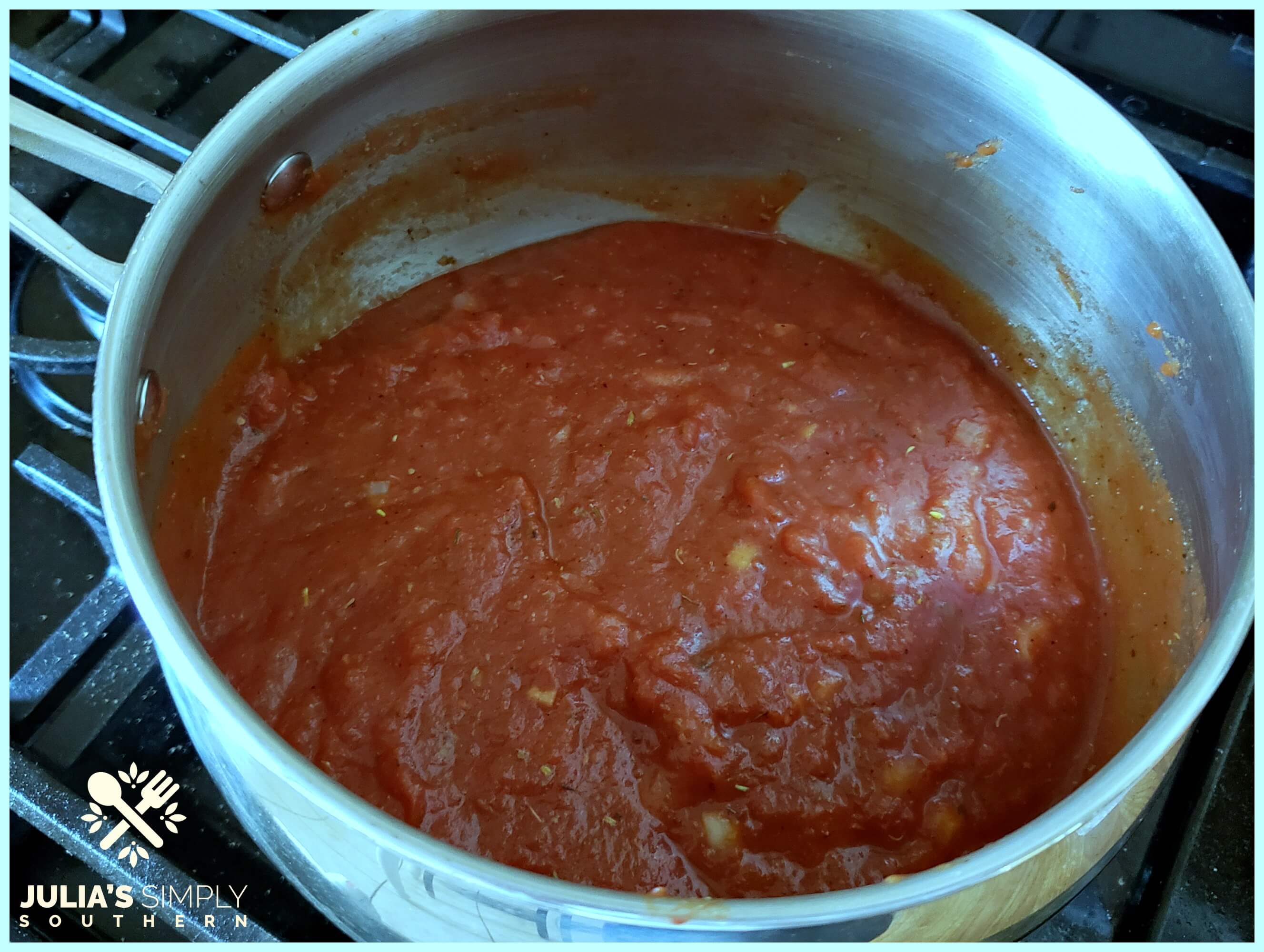 Pot simmering a batch of homemade sauce