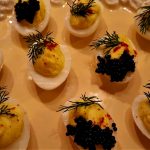 deviled quail eggs on a serving platter