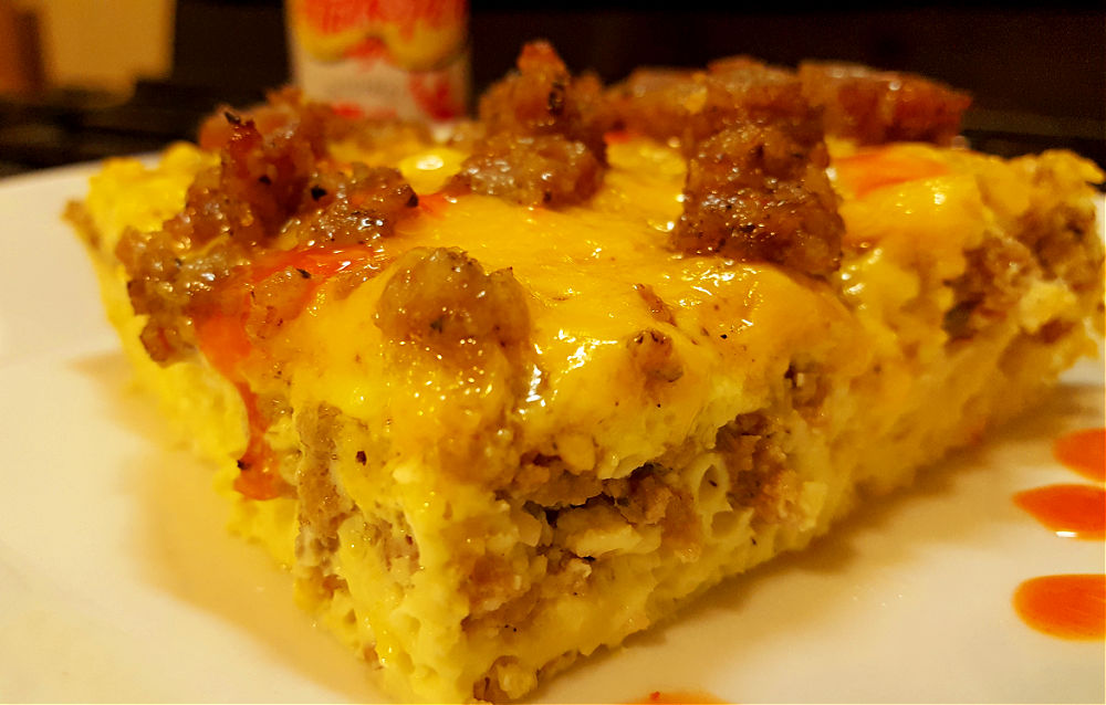 A sausage, egg, and cheese breakfast casserole with a bit of hot sauce for Easter Breakfast.
