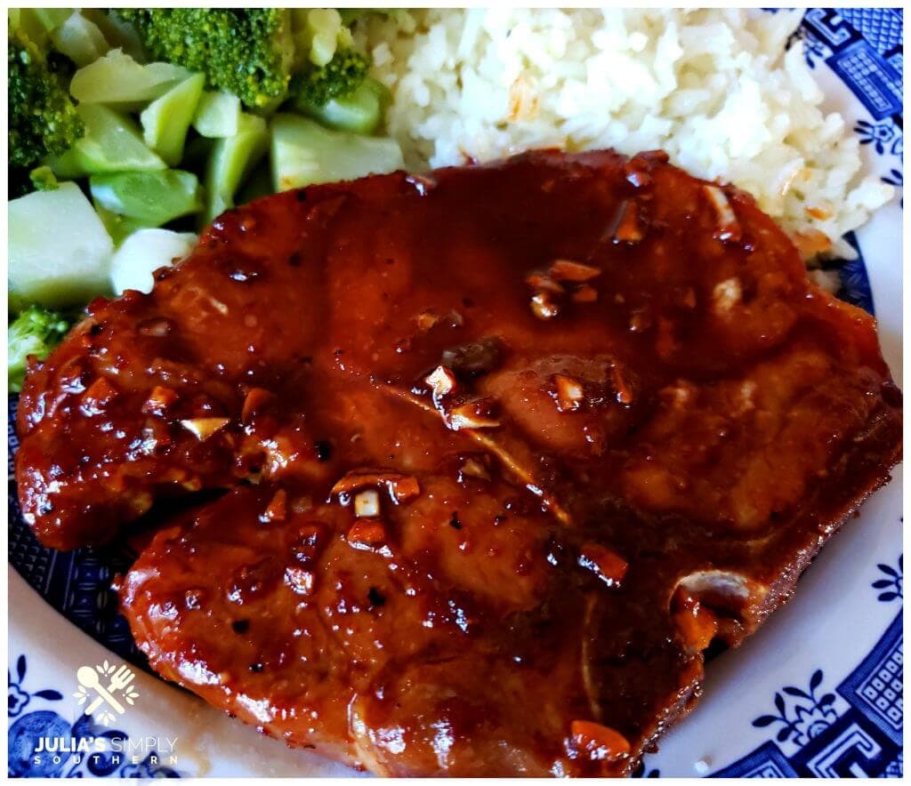 Asian Style sticky pork chops on a blue and white plate