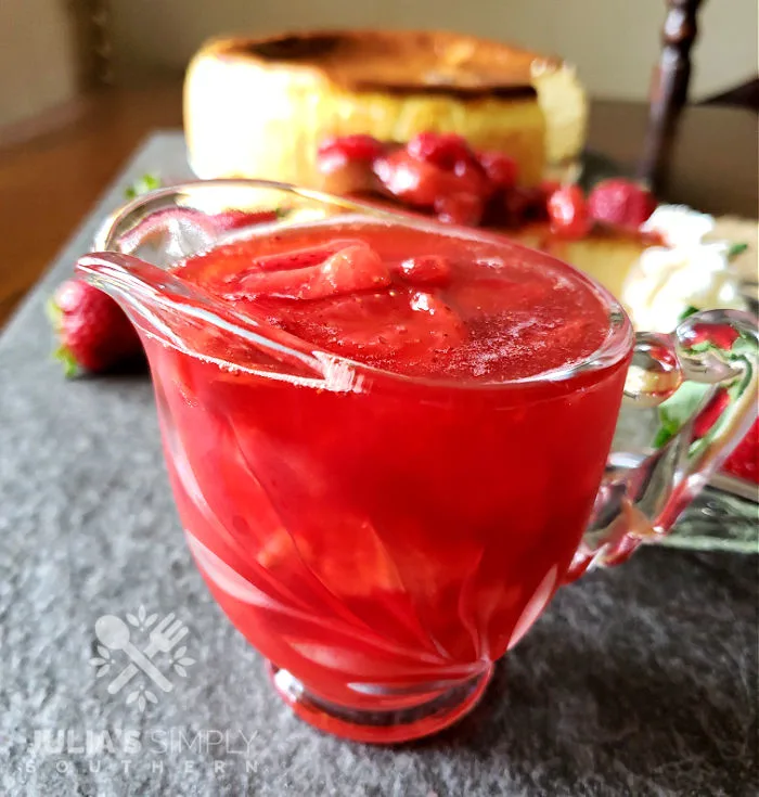 Strawberry topping recipe for cheesecake in a glass serving dish