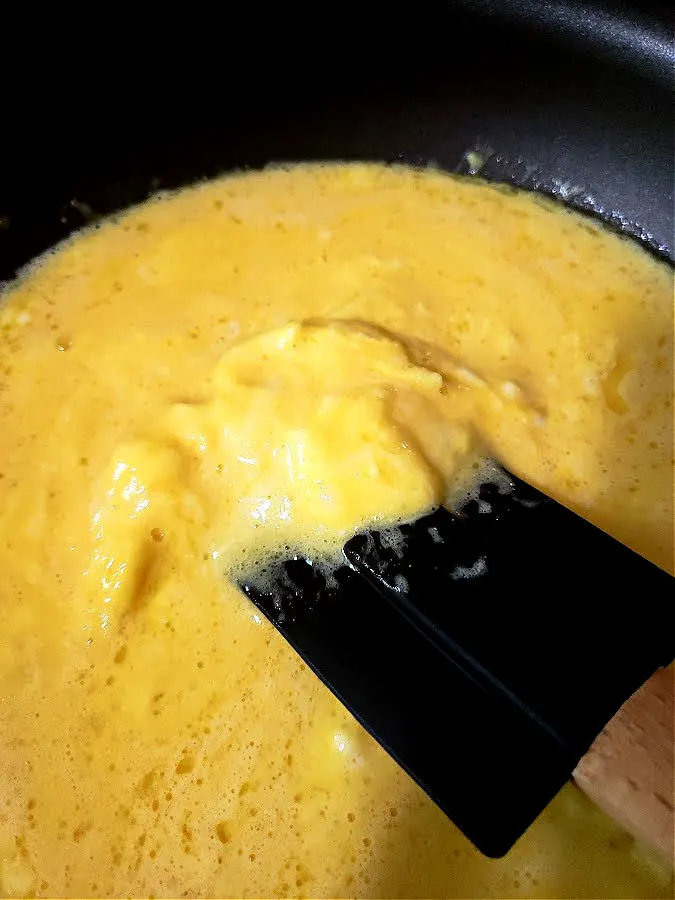 nonstick skillet with scrambled eggs