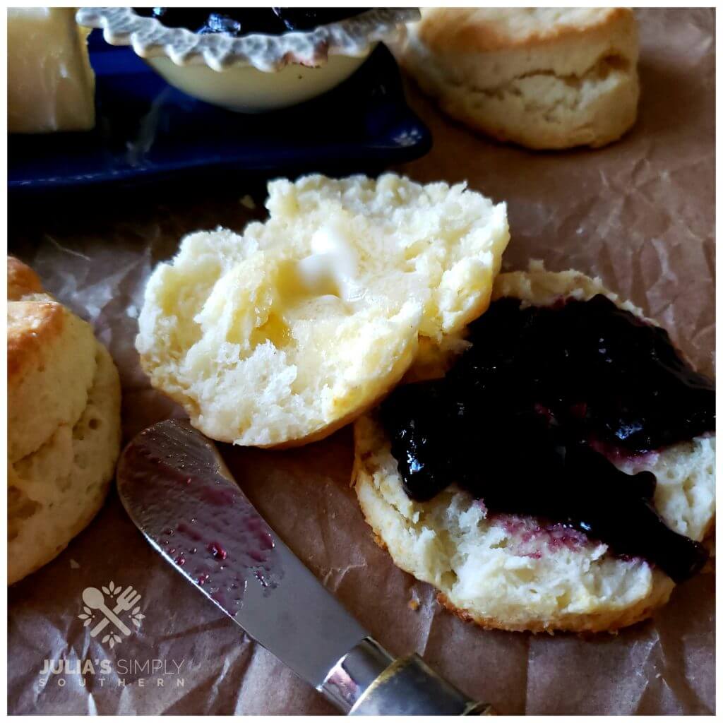 Blackberry jam on a cream biscuit