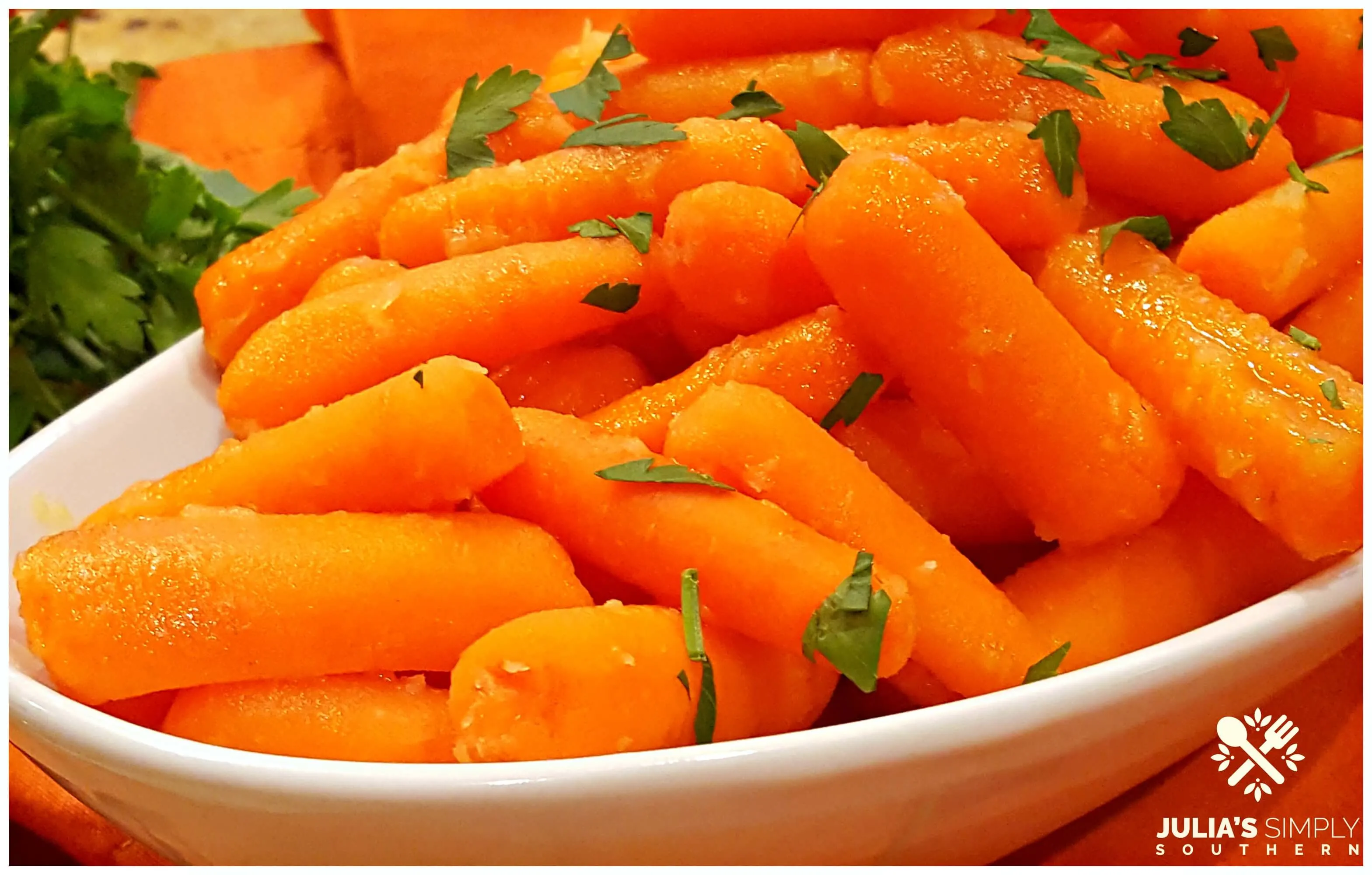 Glazed Carrot Recipe with parsley in a white bowl