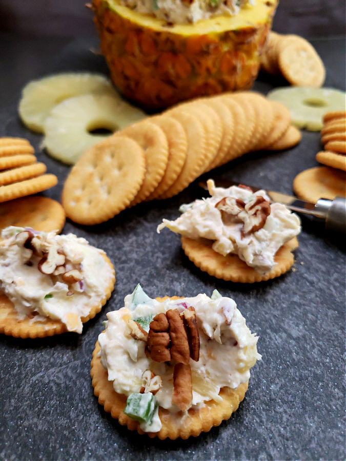 crackers with pineapple cream cheese spread with pecans