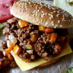 Loose Meat sandwich with homemade sauce recipe on sesame seed buns