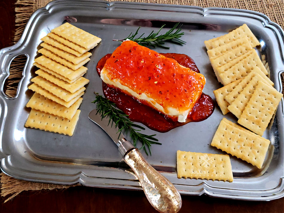 Creamy Cheese and red pepper jelly with club crackers