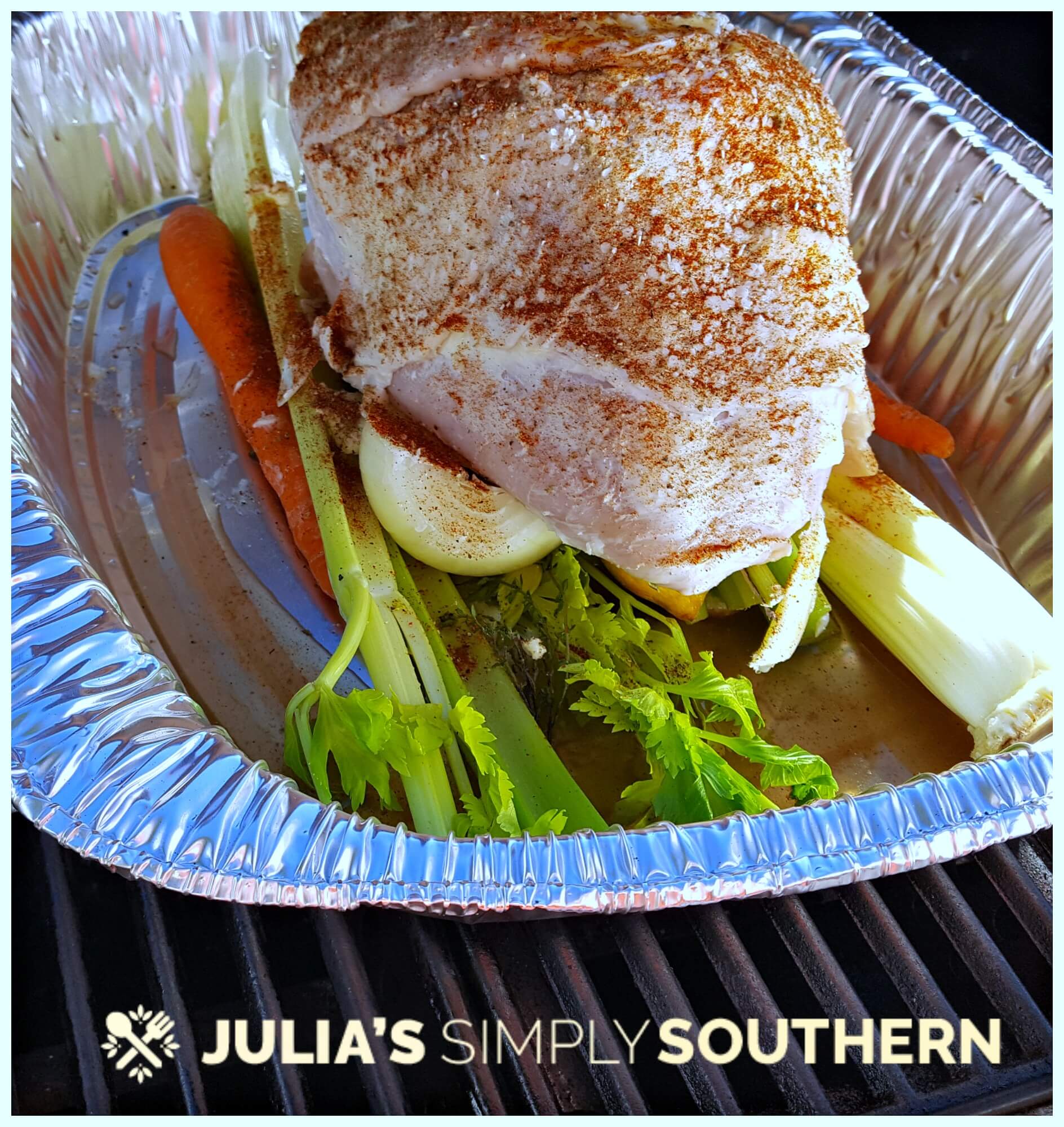 Grilling a turkey breast in a roasting pan