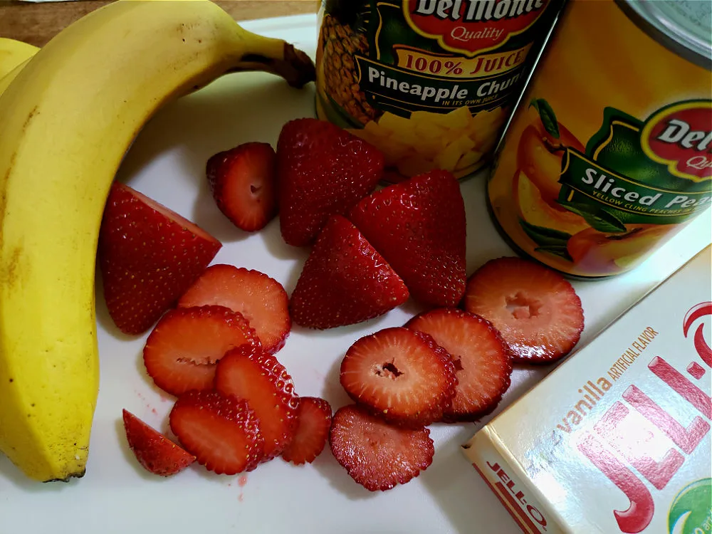 Ingredients for fruit salad on a cutting board