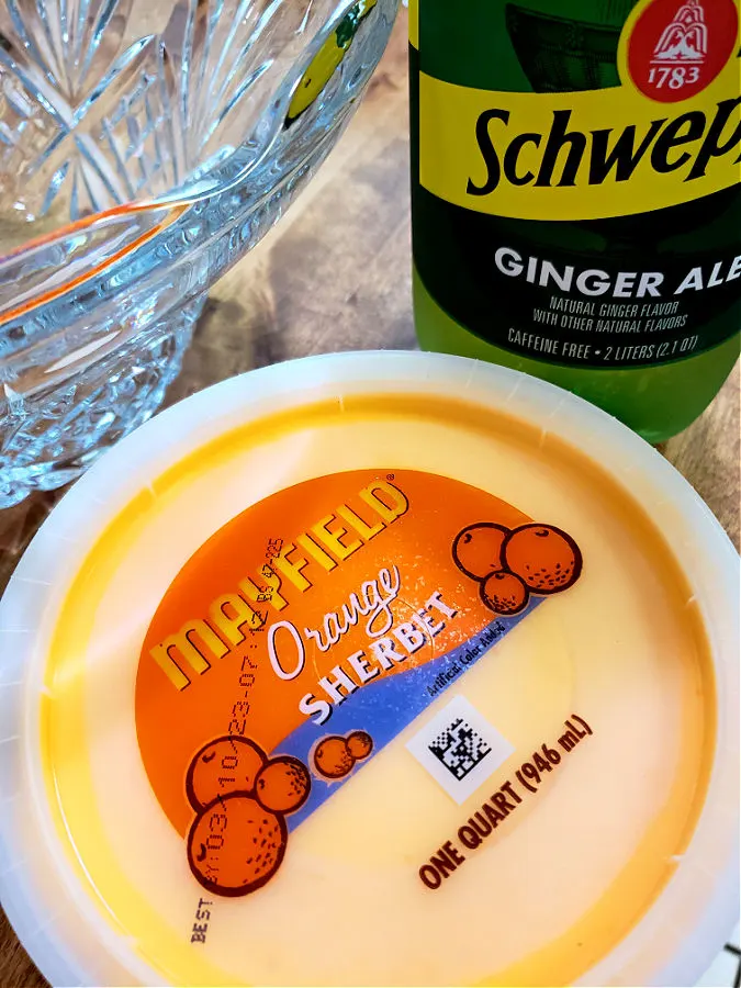 Ingredients to make orange sherbet punch with ginger ale
