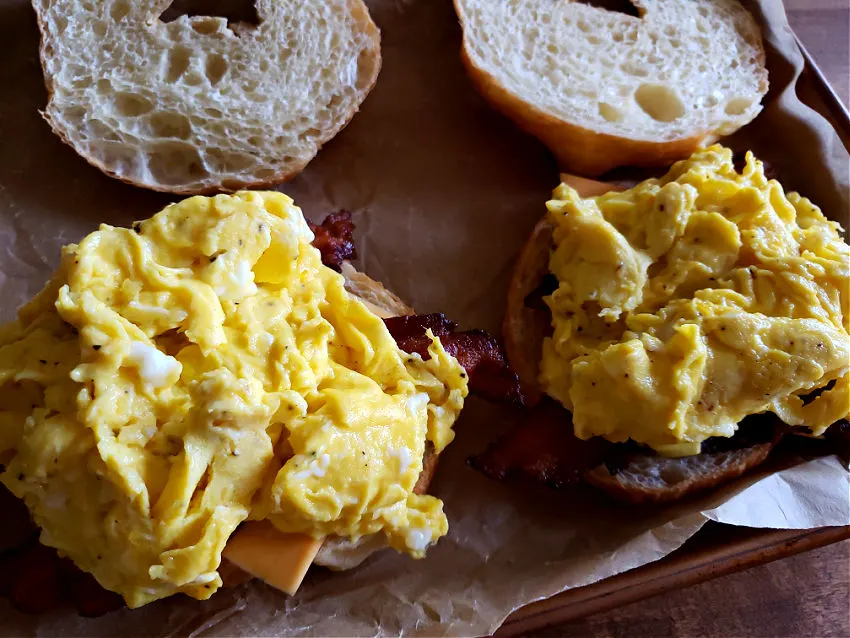 Making breakfast sandwiches with bakery croissants 