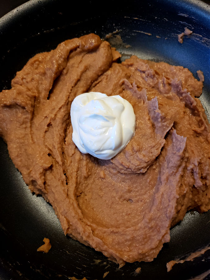 how to make the best refried beans like a restaurant - add sour cream
