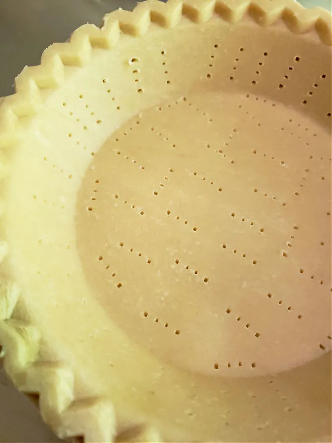 Preparing a frozen pie crust for baking