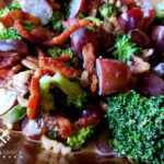 Crunchy Broccoli Salad Recipe showing off the grapes, bacon and pecans - sweet and savory