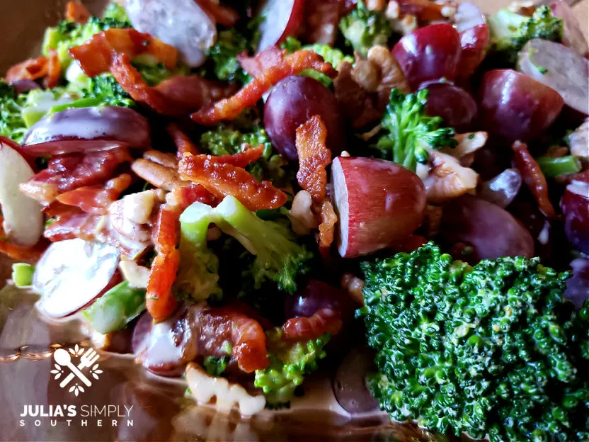 Crunchy Broccoli Salad Recipe showing off the grapes, bacon and pecans - sweet and savory