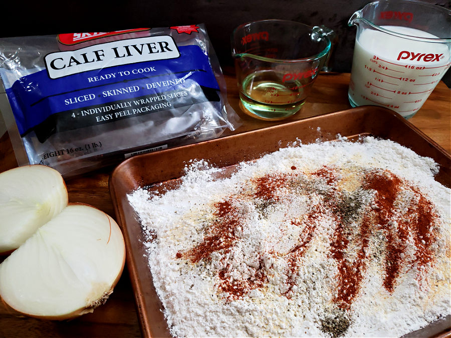 wooden butting board with the ingredients needed for preparing calf liver