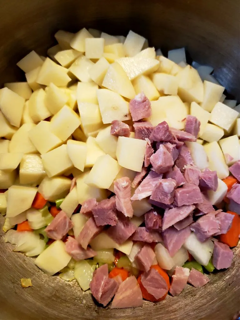 chopped potatoes and leftover holiday ham for soup