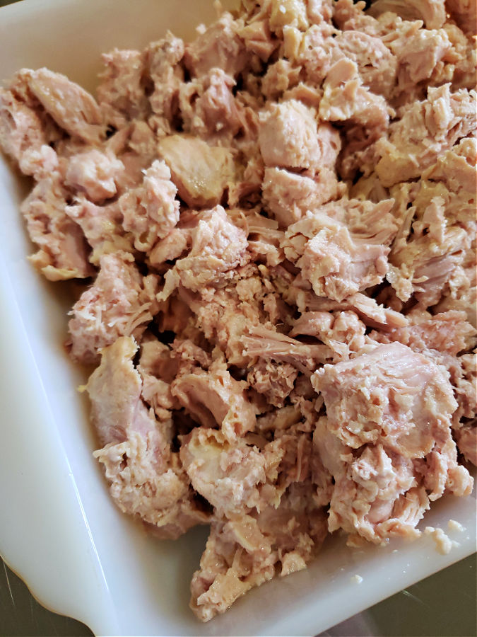 canned turkey meat in a square baking dish