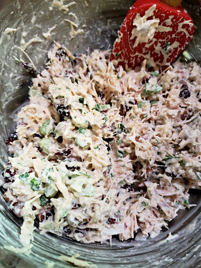 Mixing up chicken salad with a spatula. Kirkland Canned Chicken Salad Recipe