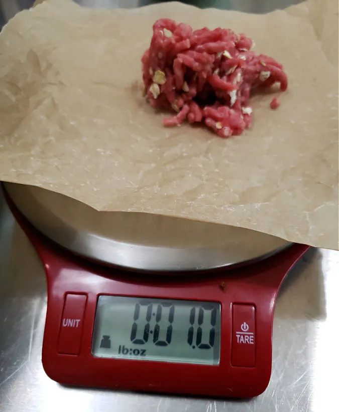 using a food scale to make meatballs of equal size for even cooking in meatballs and cream of mushroom gravy recipe