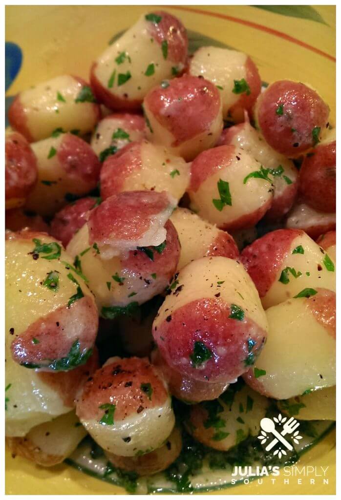 Red baby new potatoes glazed with fresh herbs and butter