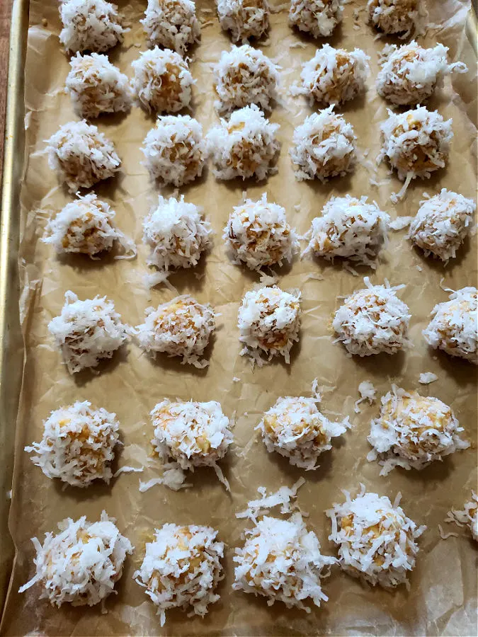 Baking sheet of snowball orange balls candy