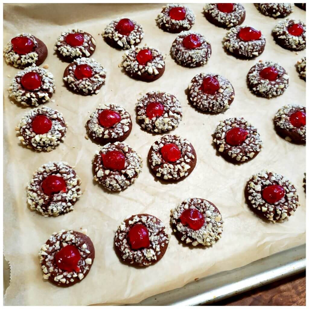 chocolate cookies on a sheet pan - easy Chocolate Cherry Almond Christmas Cookies recipe