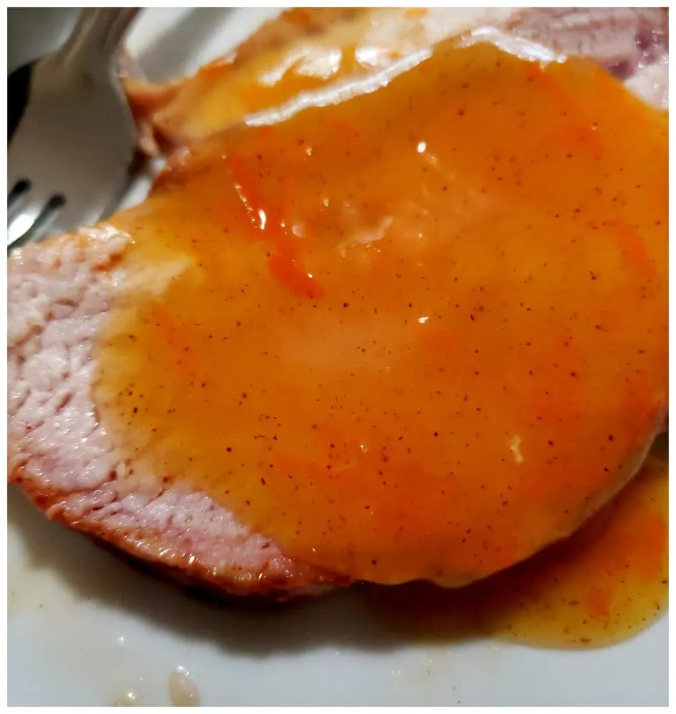 Beautiful holiday spiced orange sauce served with pork roast