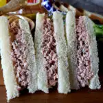 Old Fashioned Bologna Salad Recipe spread on Bunny white sandwich bread