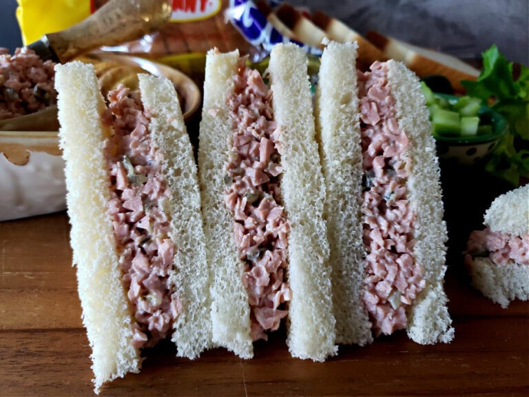 Old Fashioned Bologna Salad Recipe spread on Bunny white sandwich bread