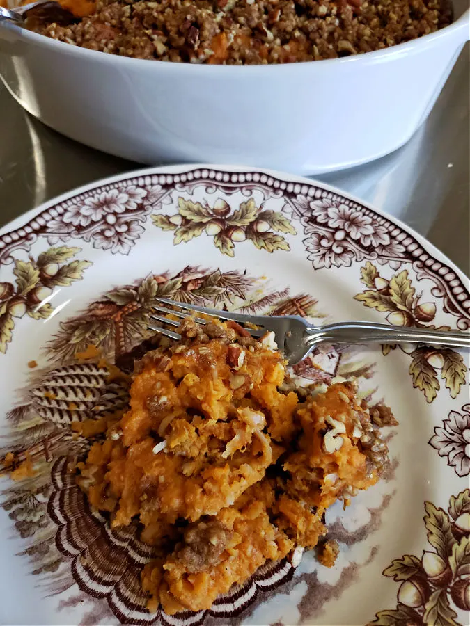 Thanksgiving pattern plate with a serving of sweet potato soufflé.