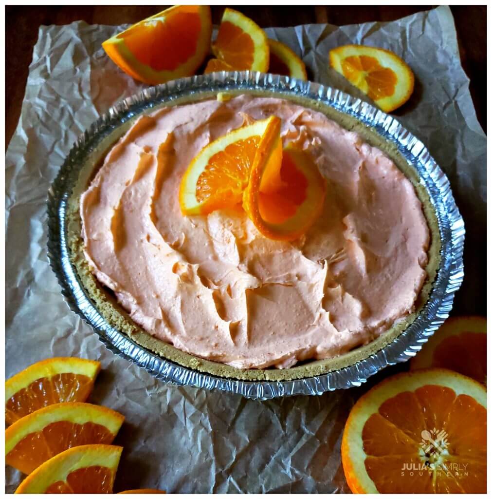 Orange Dreamsicle Chiffon Pie garnished with fresh orange slices
