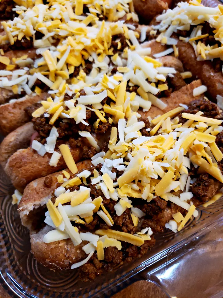 Chili and Cheese Hot Dogs oven baked with cheddar