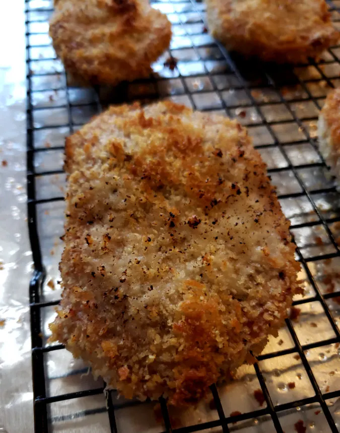 Oven Fried Pork Chops on a baking sheet